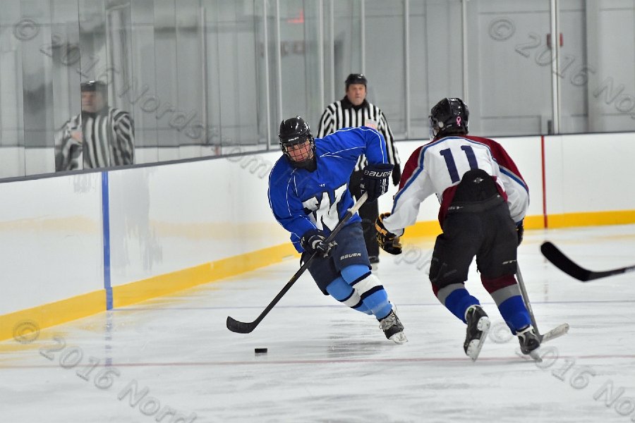 Wheaton College Men\'s Ice Hockey vs Middlesex Community College. - Photo By: KEITH NORDSTROM